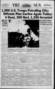 Front page of The Baltimore Sun newspaper reporting on the Baltimore Riot of 1968, with headlines about troops and curfew